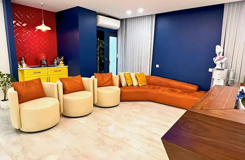 Waiting area with lounge seating at Dr. Yilmaz's clinic on Bağdat Caddesi